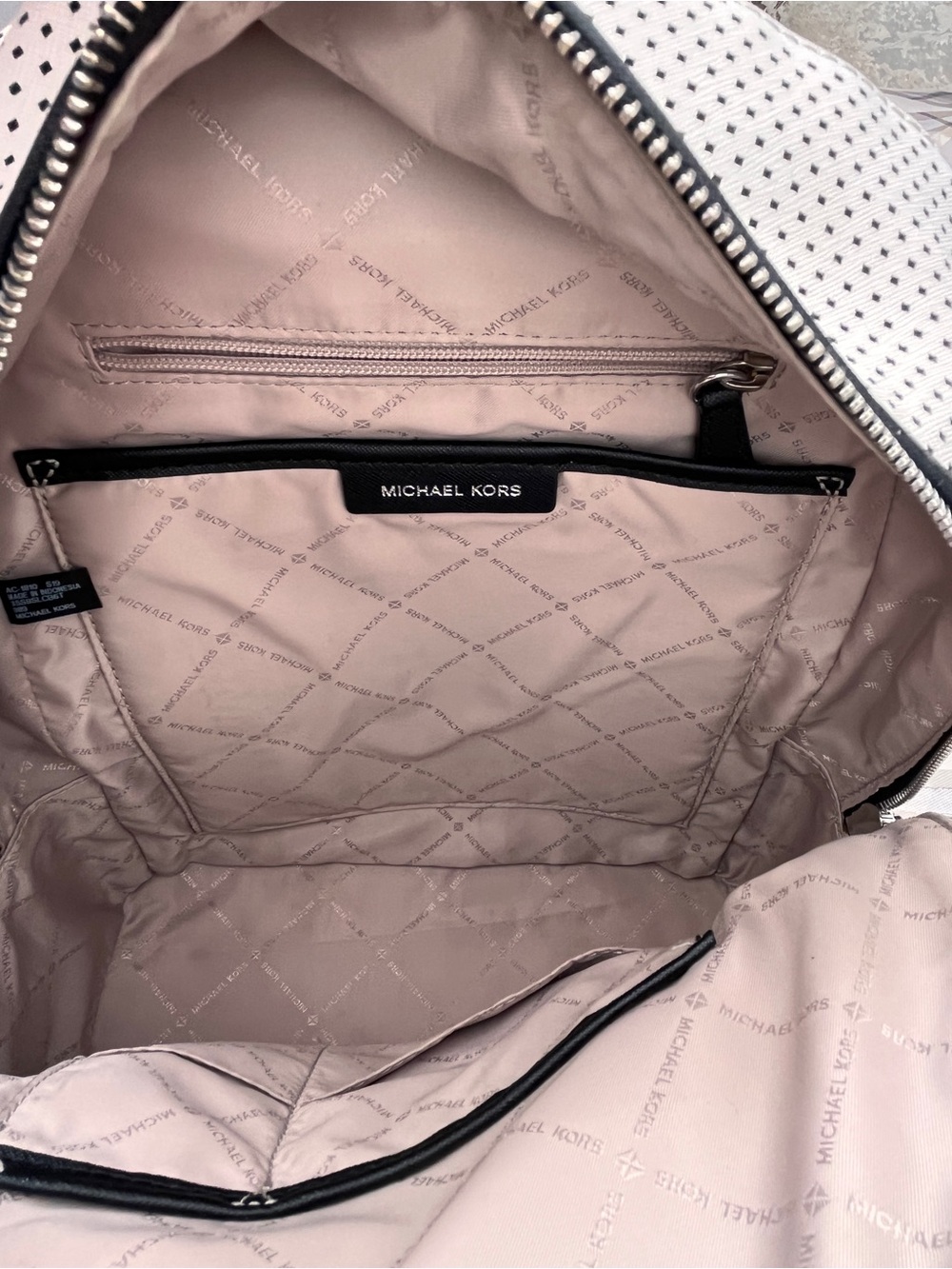 Michael Kors White Perforated Backpack with Black Trim - Picture 3 of 10